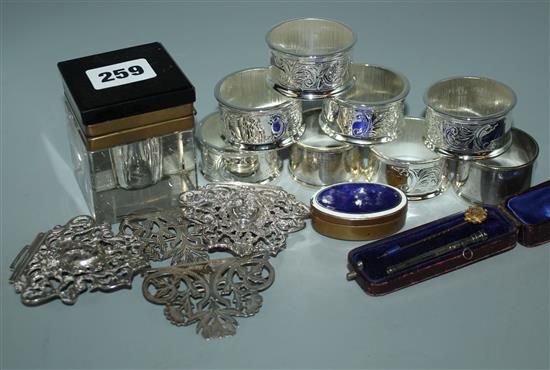 Embossed silver buckle, napkin rings, toothpick, etc
